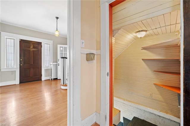 view of sauna / steam room with baseboards and wood finished floors