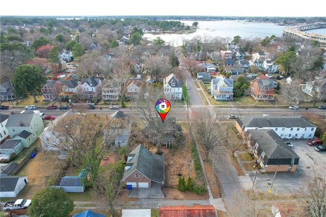 aerial view with a residential view and a water view