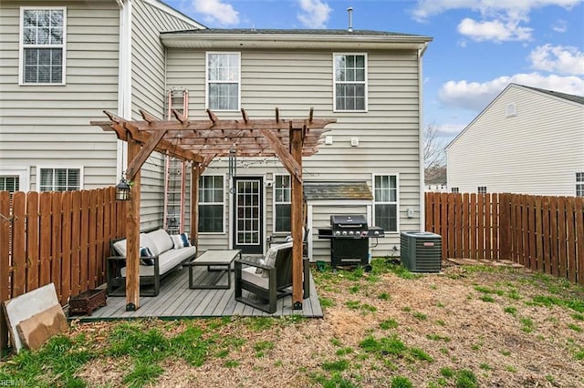 rear view of property featuring a pergola, central AC, a fenced backyard, outdoor lounge area, and a wooden deck