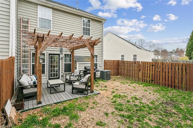 rear view of property with a fenced backyard, a pergola, central AC, and a wooden deck