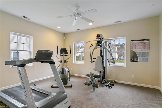 workout area with visible vents, recessed lighting, and baseboards