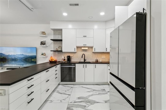 kitchen featuring open shelves, dishwasher, dark countertops, marble finish floor, and backsplash