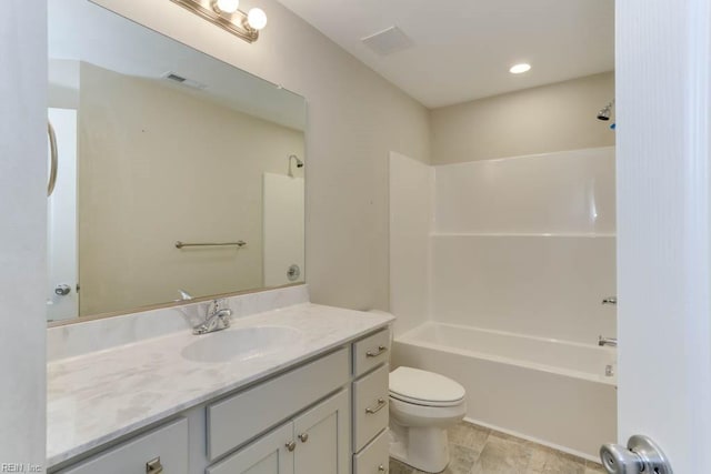 full bathroom with toilet, visible vents, shower / bathing tub combination, and vanity