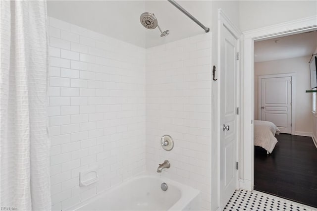 bathroom featuring shower / bath combo with shower curtain