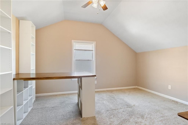 bonus room with baseboards, a ceiling fan, lofted ceiling, and carpet floors