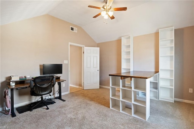 carpeted office featuring visible vents, baseboards, ceiling fan, and vaulted ceiling