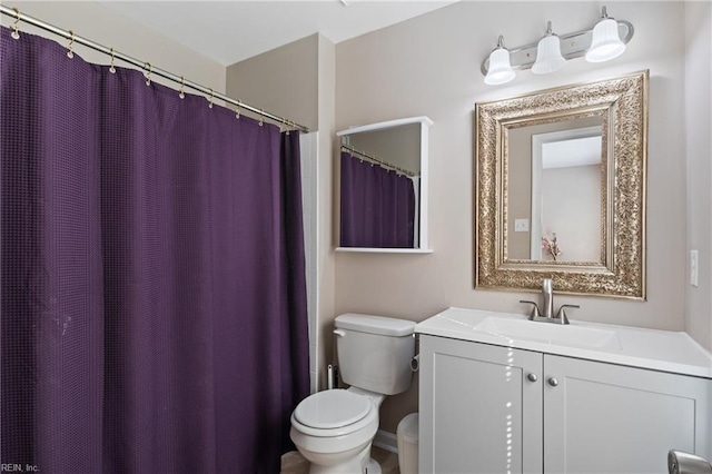 full bath featuring toilet and vanity