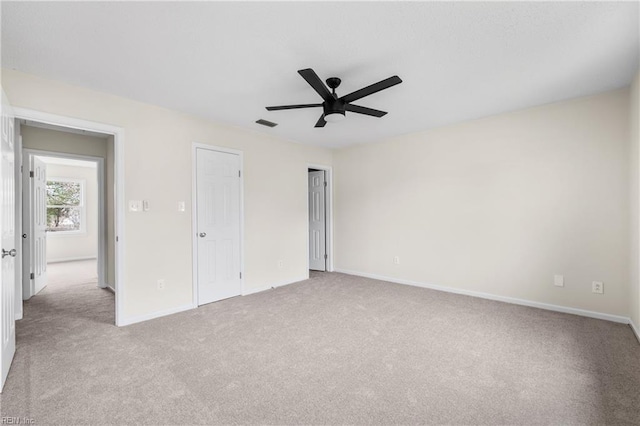 unfurnished bedroom with visible vents, a ceiling fan, baseboards, a closet, and carpet