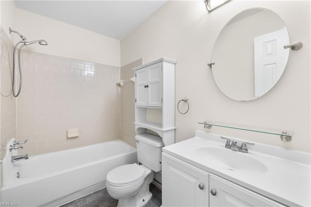 bathroom featuring shower / bathing tub combination, vanity, and toilet