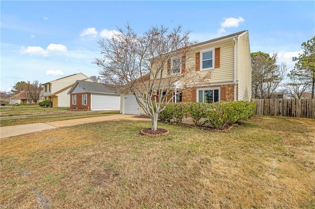 view of front of house with an attached garage, fence, concrete driveway, and a front yard