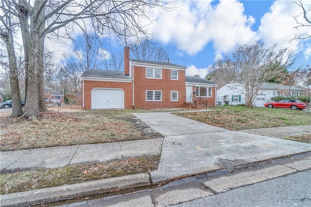 view of front of property featuring concrete driveway, brick siding, a chimney, and an attached garage