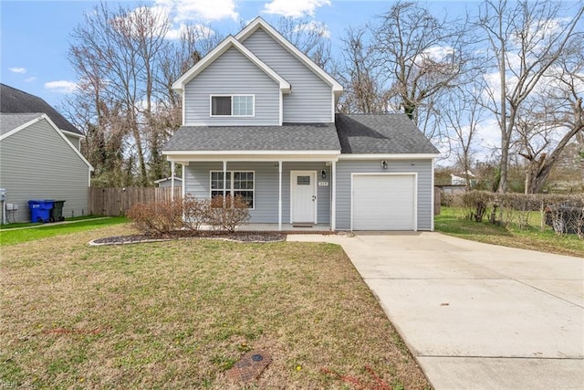 traditional-style home featuring driveway, a front lawn, a porch, fence, and a garage