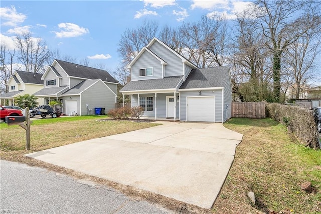 traditional home with a front yard, fence, an attached garage, a shingled roof, and concrete driveway