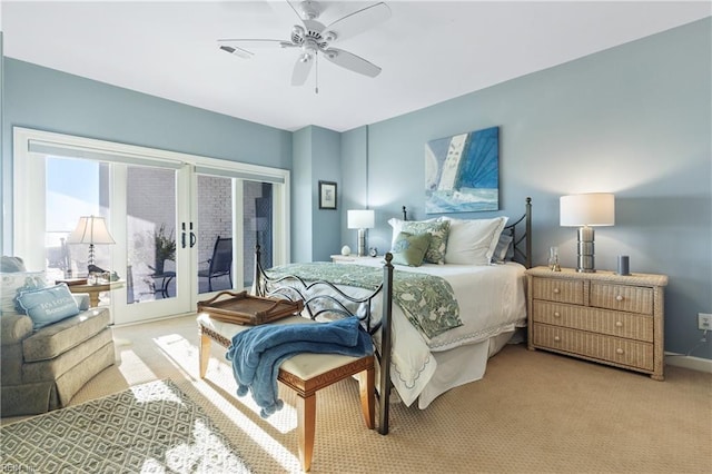 bedroom with ceiling fan, carpet flooring, visible vents, baseboards, and access to exterior