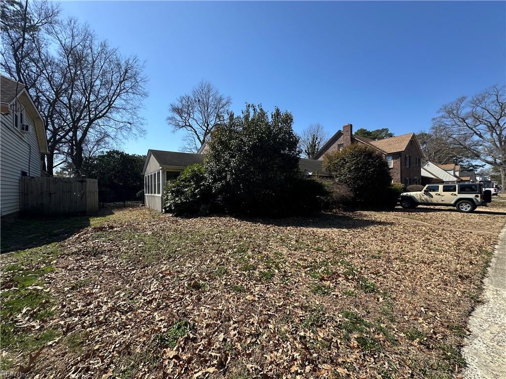 view of yard with fence