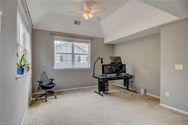 exercise area featuring carpet flooring, a ceiling fan, visible vents, vaulted ceiling, and baseboards