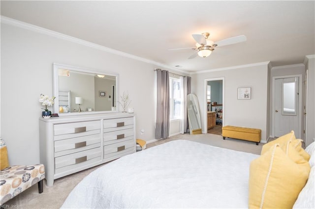 bedroom featuring baseboards, light colored carpet, ceiling fan, ornamental molding, and ensuite bathroom