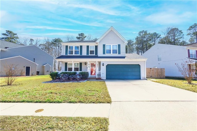 traditional home with driveway, a garage, fence, and a front lawn