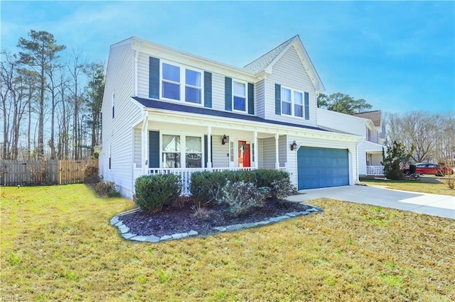 traditional-style house featuring a porch, concrete driveway, fence, a garage, and a front lawn