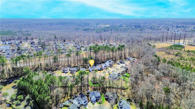 aerial view featuring a residential view and a view of trees