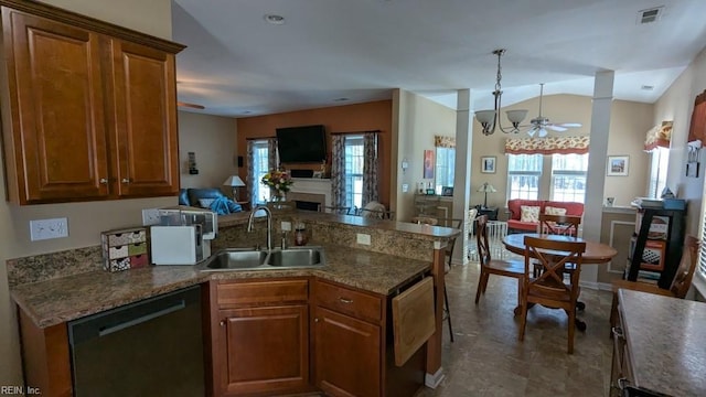 kitchen with a wealth of natural light, open floor plan, a sink, and dishwashing machine