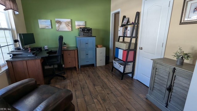 home office with dark wood-type flooring