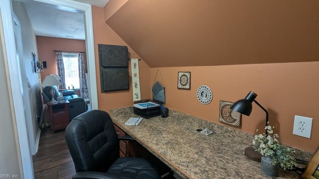 office with vaulted ceiling and wood finished floors