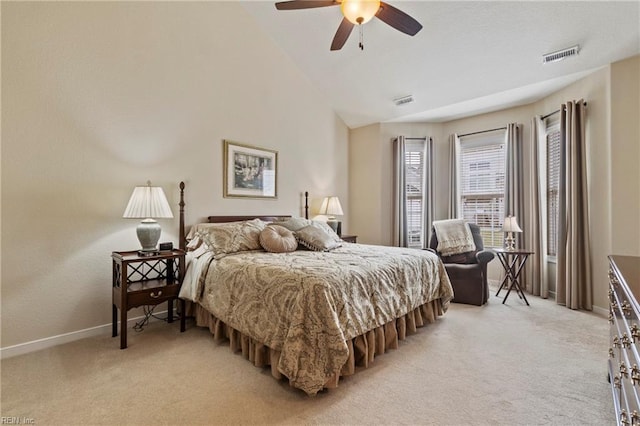 bedroom with visible vents, light carpet, and baseboards