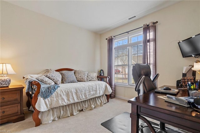 bedroom featuring carpet flooring, visible vents, and baseboards