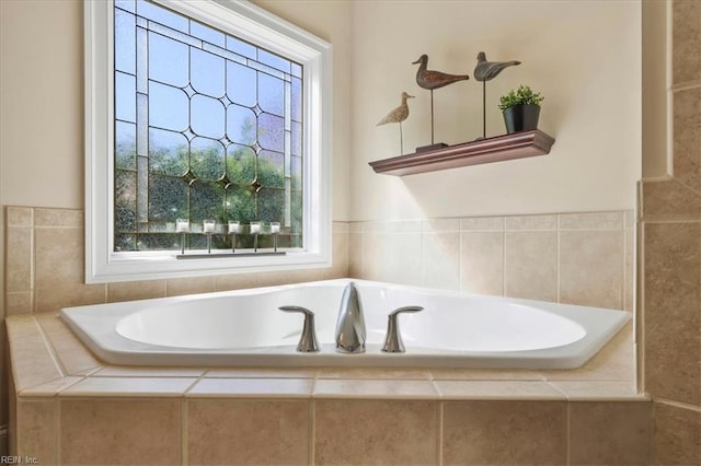 bathroom with a garden tub