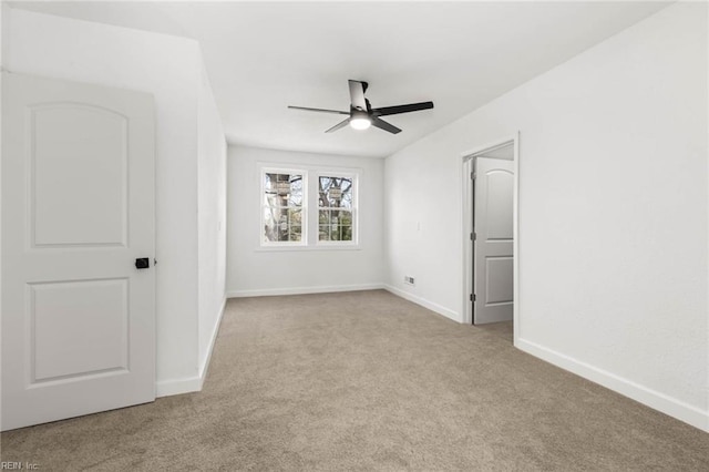 unfurnished bedroom featuring carpet floors, ceiling fan, and baseboards