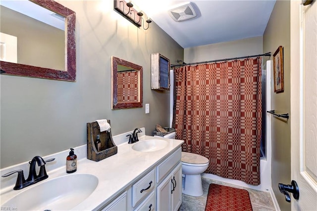 full bath with toilet, double vanity, shower / bath combo with shower curtain, and a sink