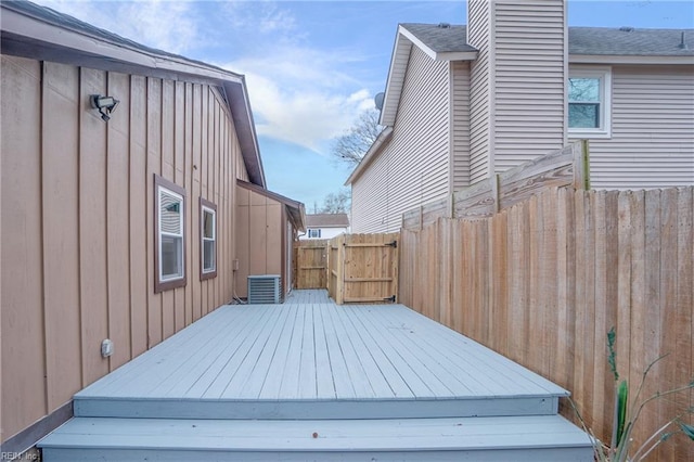 deck with central AC and fence