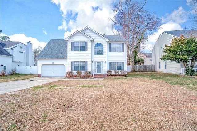 view of front of home with driveway, a shingled roof, an attached garage, and fence