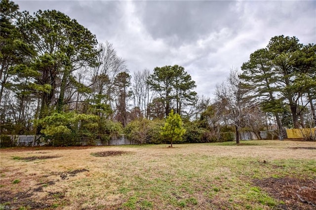 view of yard with fence