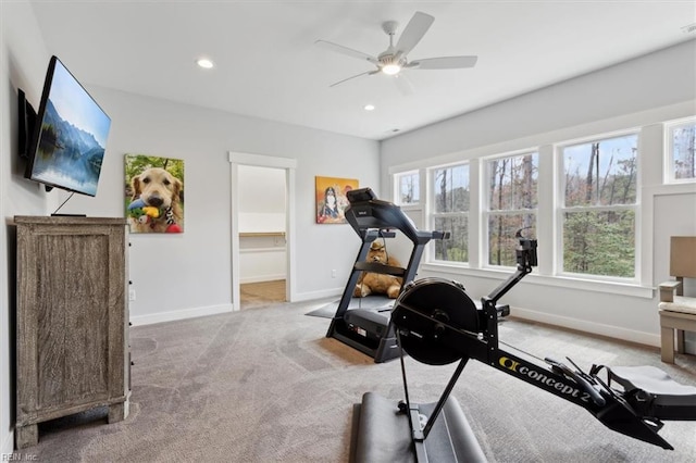 exercise room with carpet floors, recessed lighting, a wealth of natural light, and baseboards