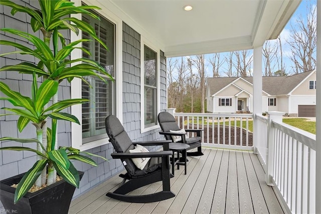 wooden deck featuring covered porch