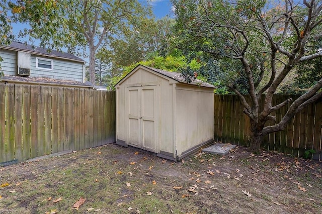 view of shed featuring a fenced backyard