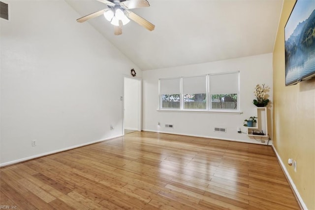 spare room with visible vents, baseboards, wood finished floors, and a ceiling fan