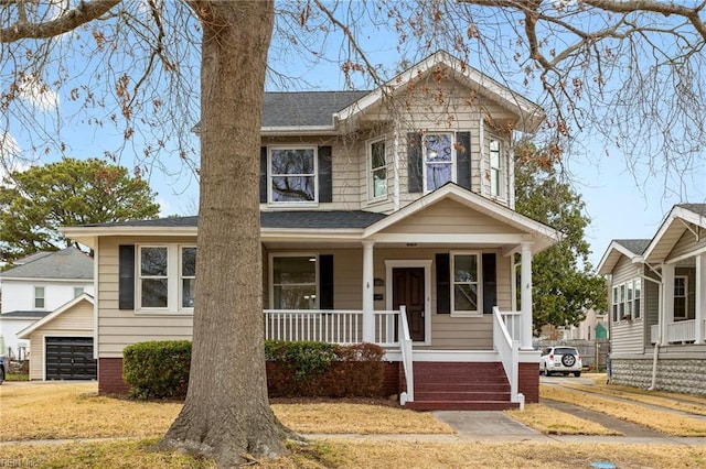 view of front of house featuring a porch and roof with shingles