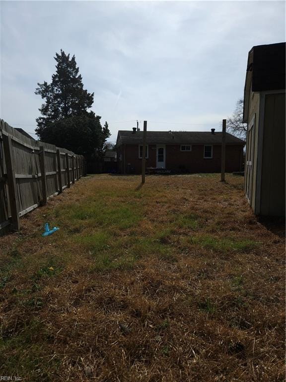 view of yard featuring fence