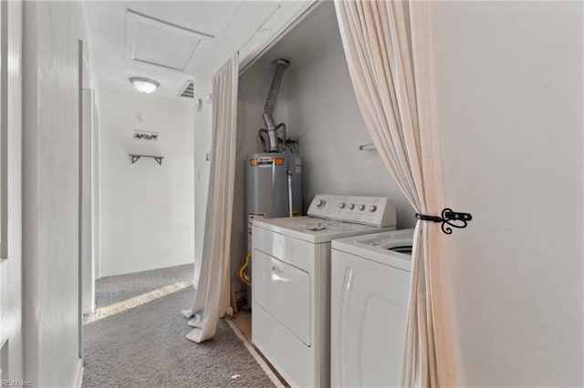 laundry room with visible vents, light carpet, water heater, separate washer and dryer, and laundry area