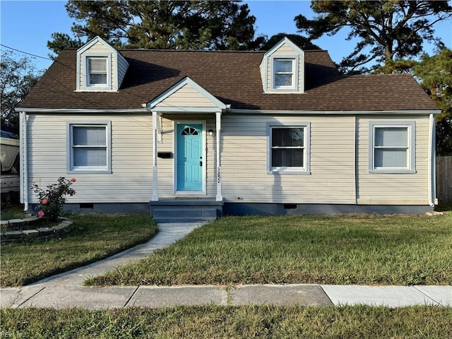 cape cod house featuring crawl space, roof with shingles, and a front yard