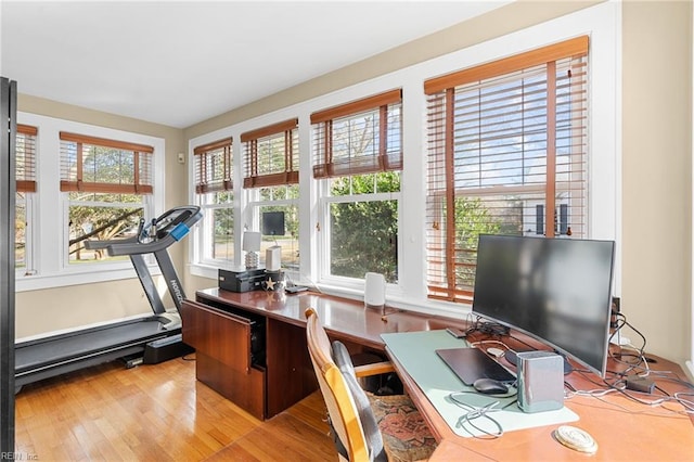 home office with wood finished floors