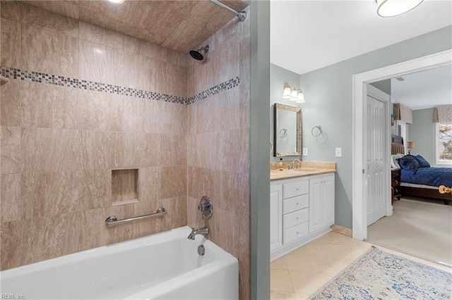 bathroom with vanity, bathing tub / shower combination, ensuite bathroom, and tile patterned flooring