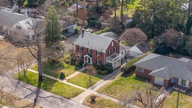 birds eye view of property with a residential view