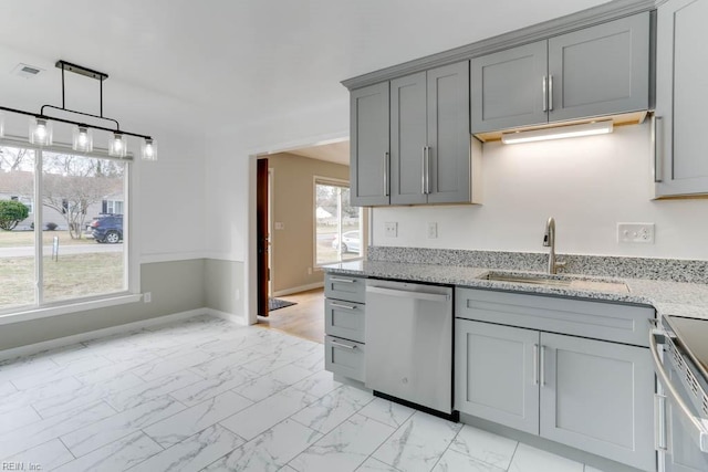 kitchen with gray cabinetry, a sink, baseboards, marble finish floor, and stainless steel dishwasher