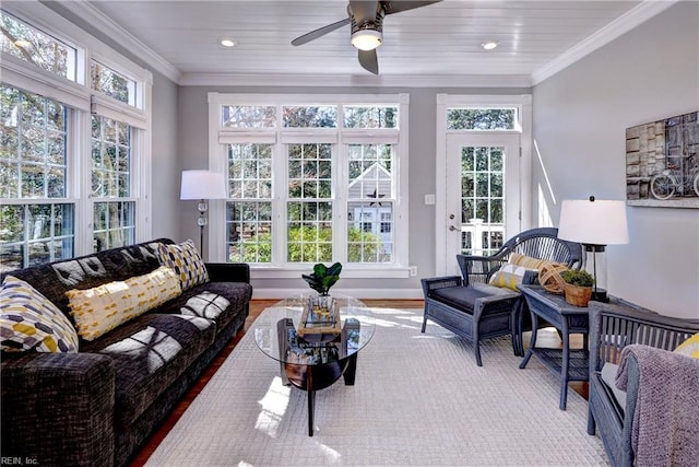 sunroom with a ceiling fan