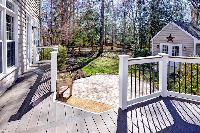 wooden deck featuring an outdoor structure