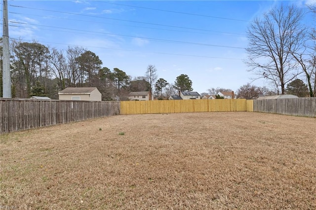 view of yard featuring fence